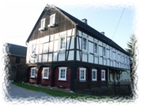 Umgebindehaus in Wehrsdorf mit Sonnenuhr